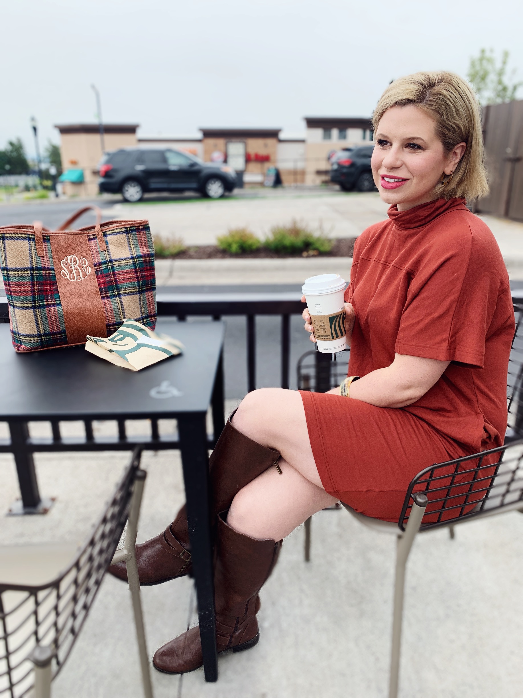 woman sharing Style Roundup and drinking coffee