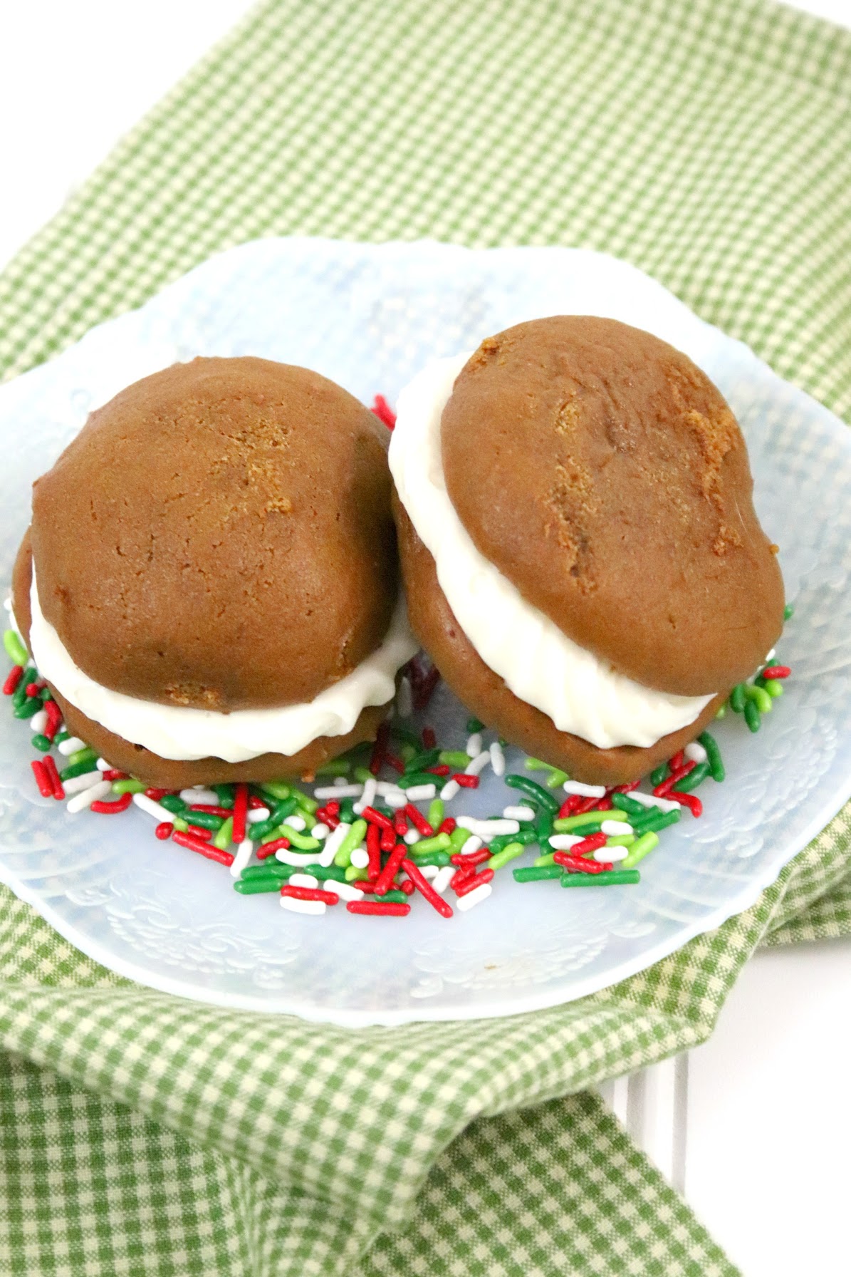 two pieces of Gingerbread Whoopie Pies on a plate 