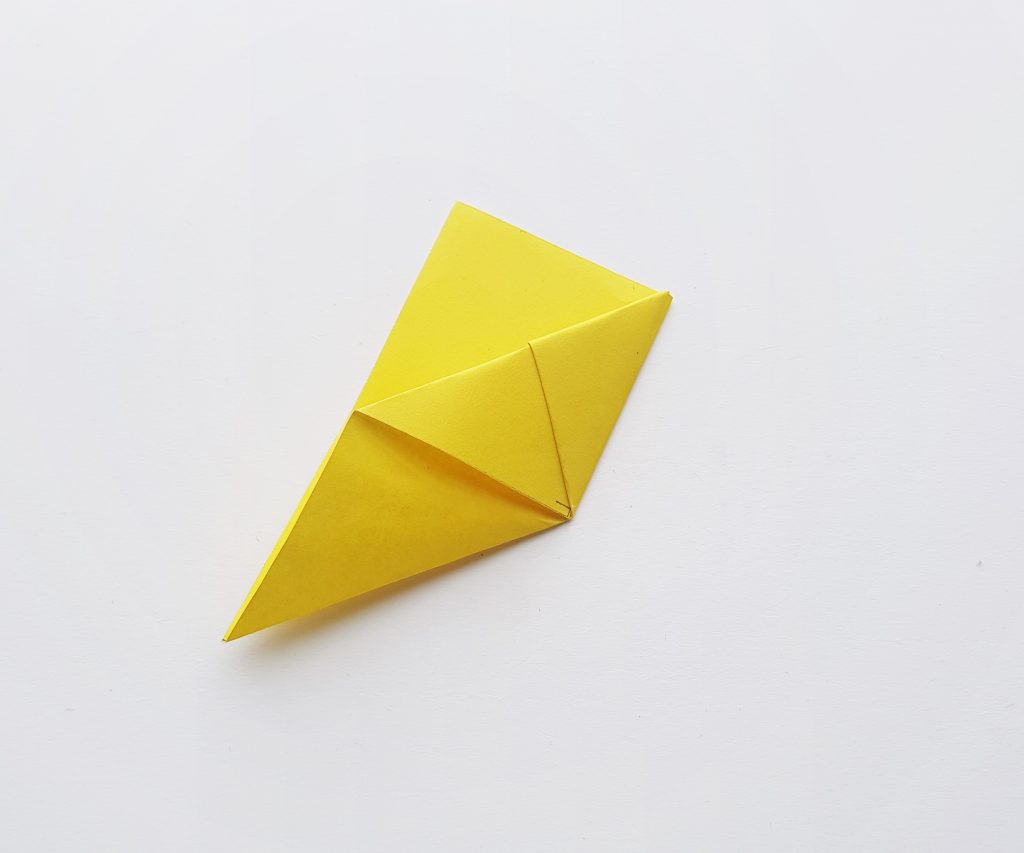 folded yellow paper 