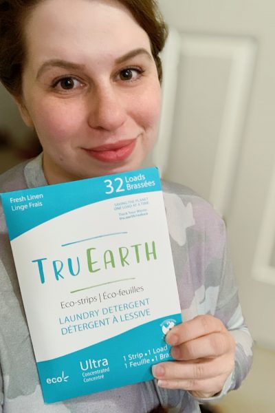 woman holding Sustainable swaps from Tru earth 