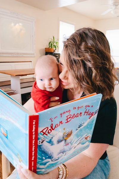 mother reading to her baby a Christian Children’s Books Under $40